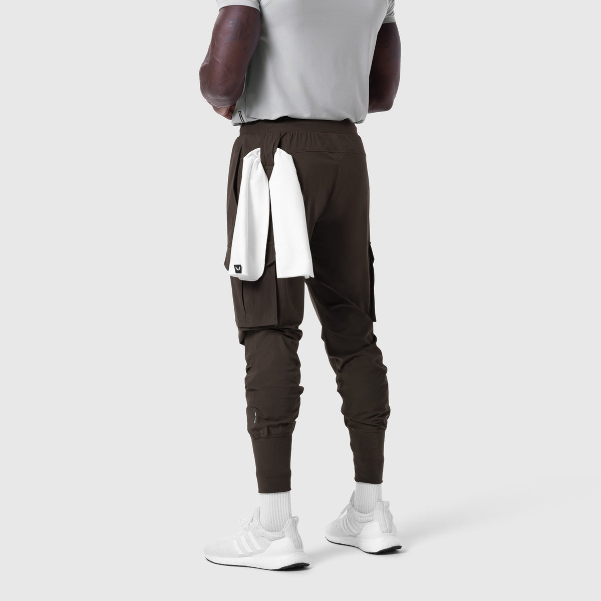 Tetra-Lite Cargo High Rib Jogger in Dark Earth, back view on model