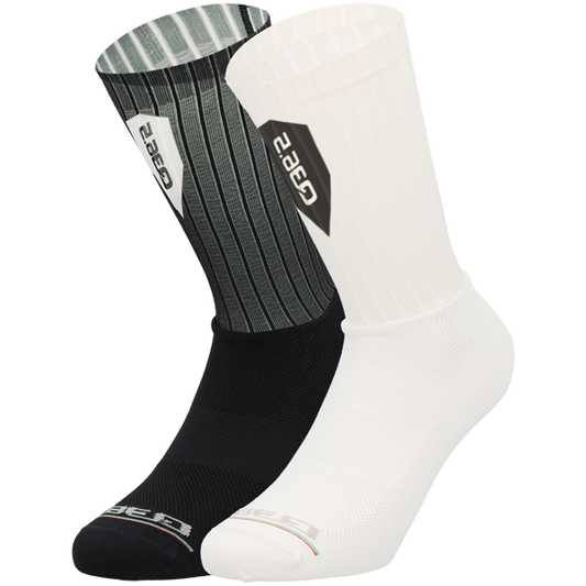 Two socks, one black and one white, with a visible brand logo on a white background.